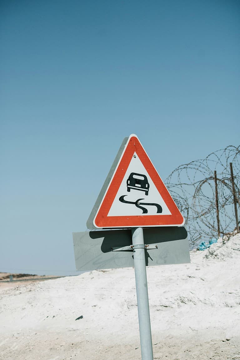how dangerous is riding a motorcycle swerving road sign