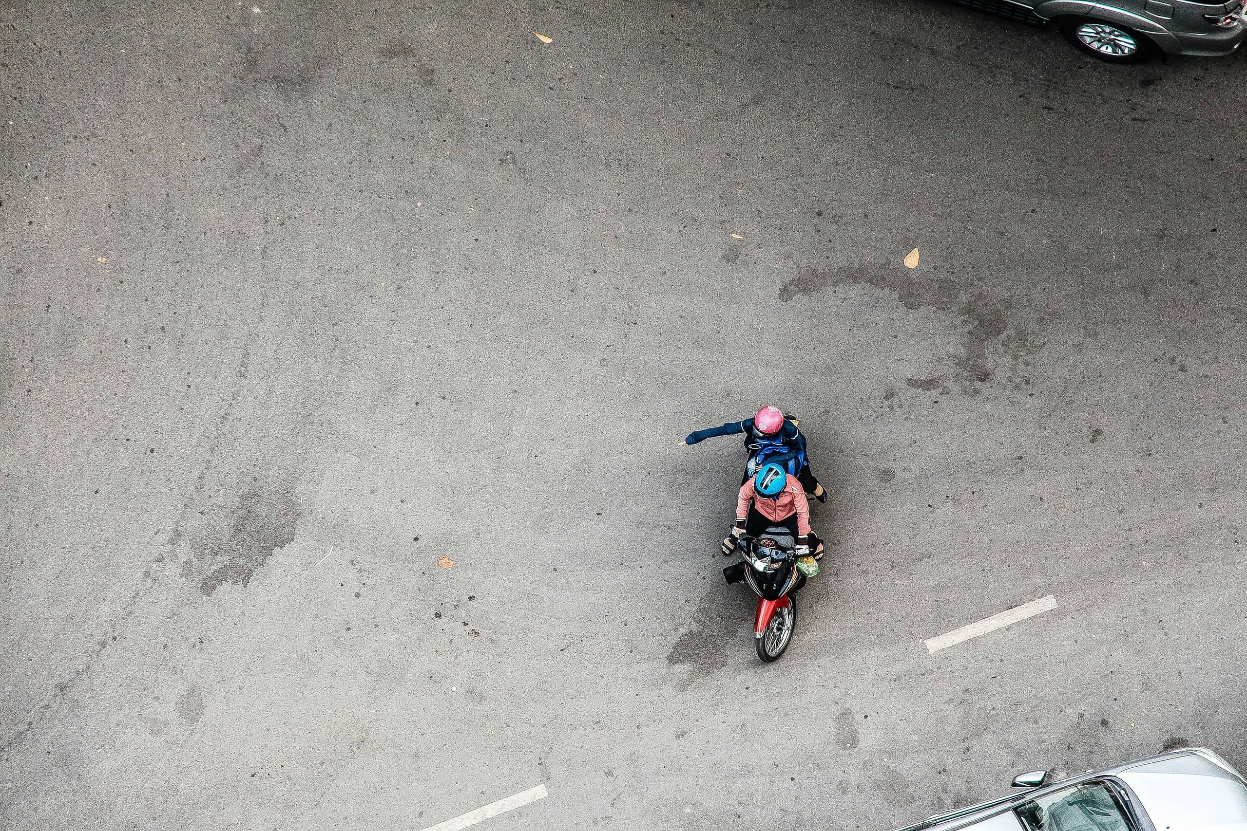 motorcycle turning in parking lot